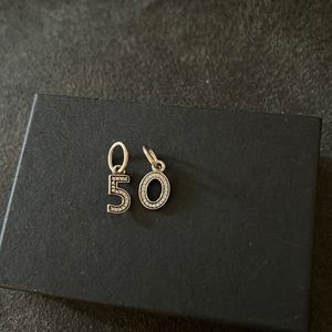 Pandora charms “5” and “0”